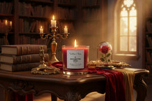 Load image into Gallery viewer, Red candle with a label on a white surface