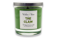 Load image into Gallery viewer, Green candle in a glass jar with a label on a white background
